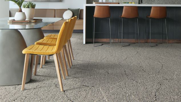 Interface Ribbon Rock carpet tile in open dining and seating area