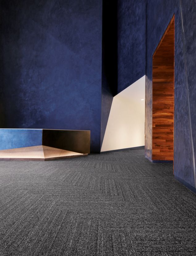 Interface WW860 carpet tile in modern open air lobby