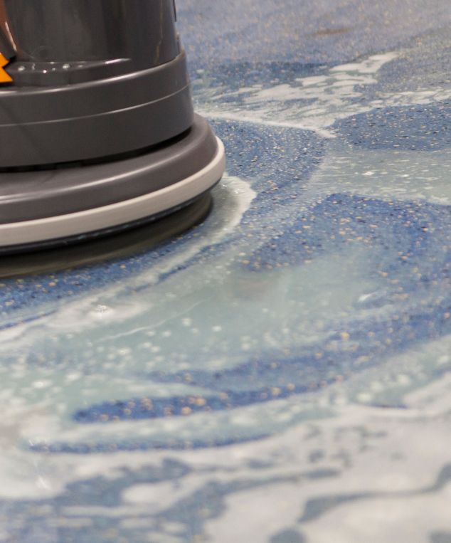 cleaning machine and soap foam on norament flooring