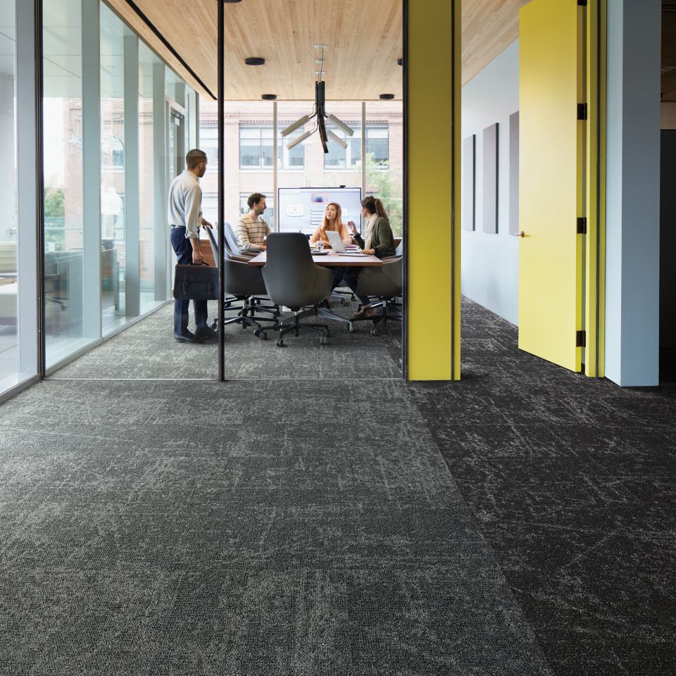 Interface Ice Breaker carpet tile in meeting room with four people