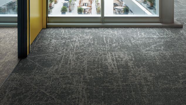 Interface Ice Breaker  carpet tile in room with glass windows showing outside seating area