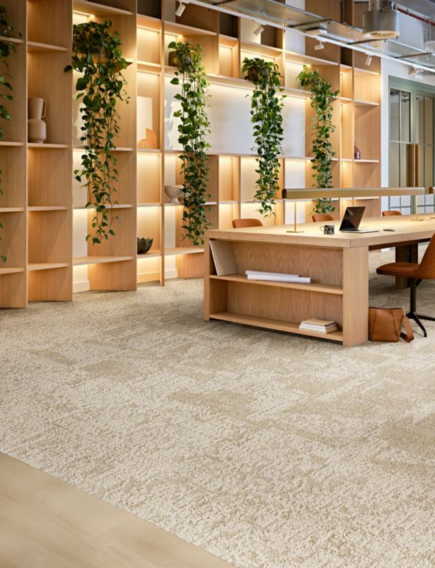 Interface In Motion and Shift Point carpet tile with Northern Grains plank LVT in open office