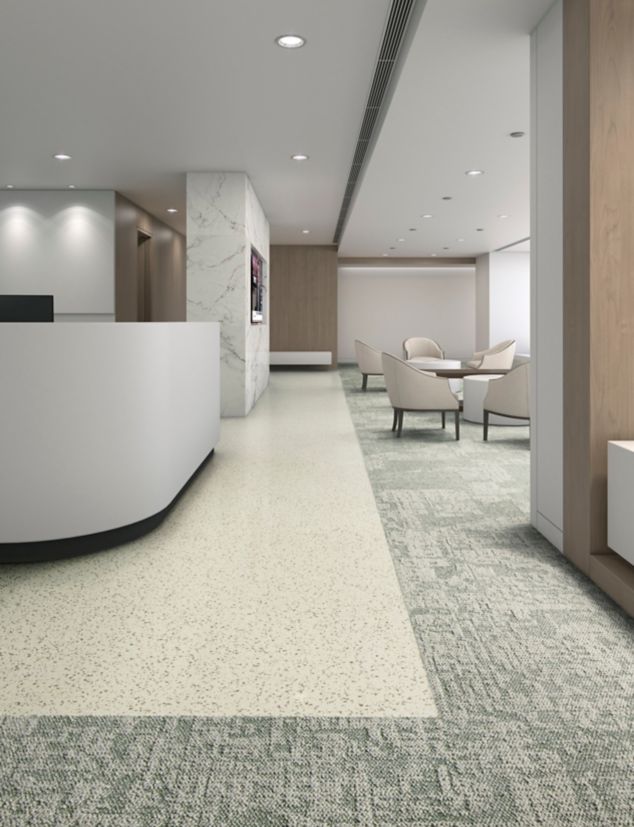 Interface In Motion and Shift Point carpet tile with nora by Interface norament pado rubber flooring in reception area and waiting room