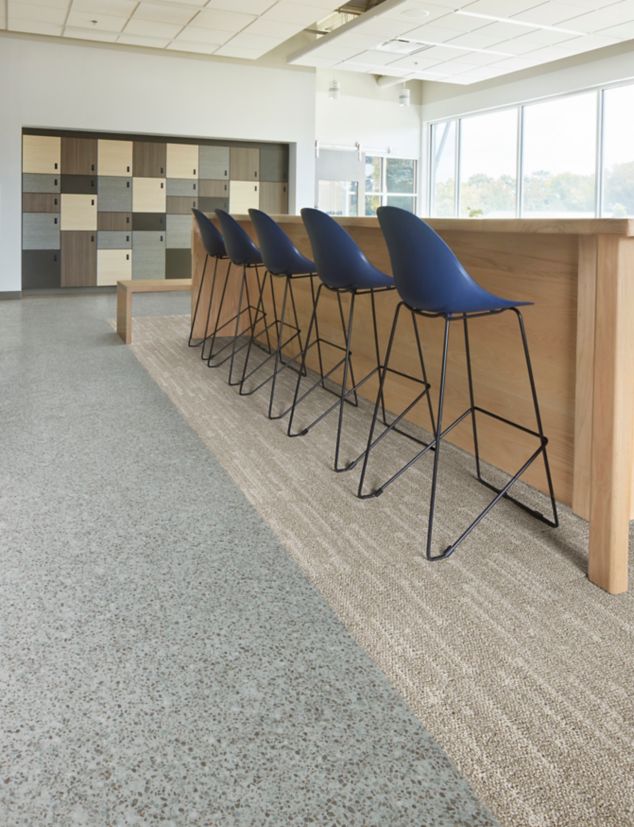 Interface In the Mix LVT in Shale and Meteor carpet tile in Fog in collaborative space