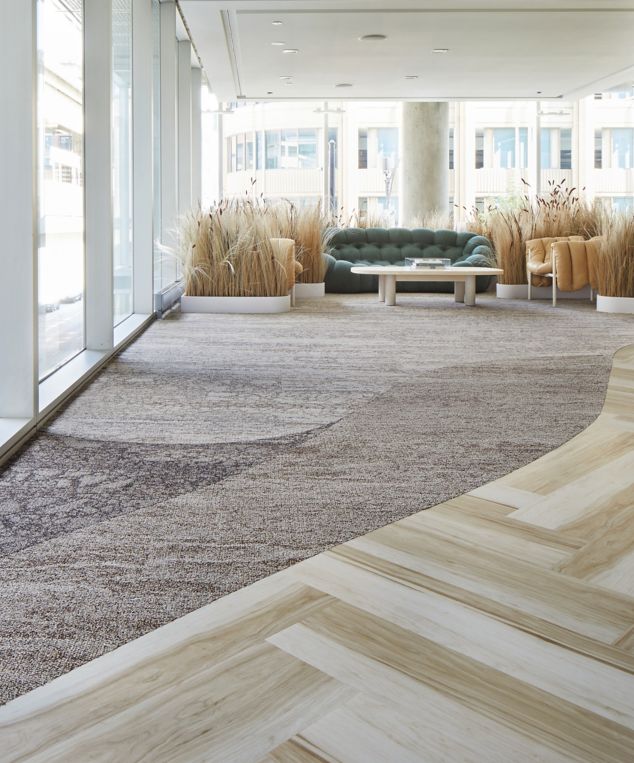 Interface Great Heights LVT with Mesa and Eben plank carpet tile in corridor and lounge