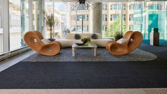 Interface E610 carpet tile with E613, E614 and E615 plank carpet tile and Hearth plank LVT in workplace seating area