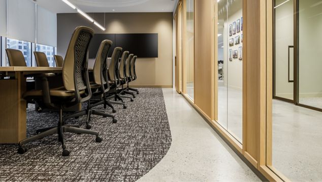 Interface WW890 plank carpet tile as area rug in corporate meeting room