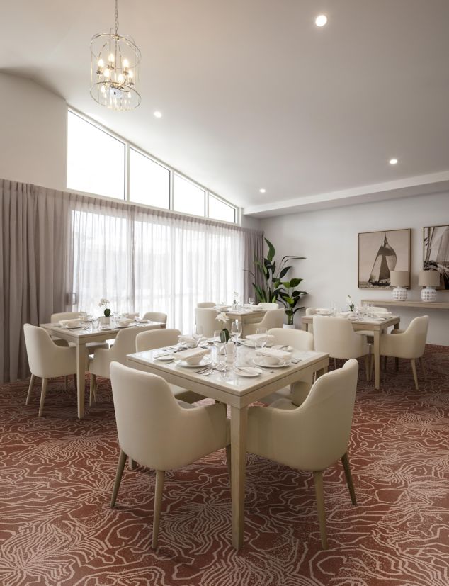 Interface LUX Contour II plank carpet tile in dining area