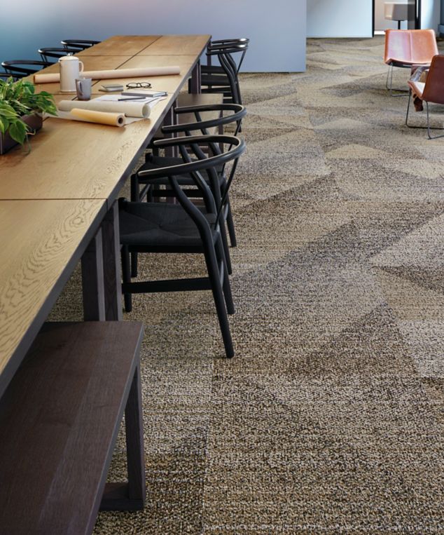 Interface Light Play carpet tile in corporate meeting room with long table and low light fixture