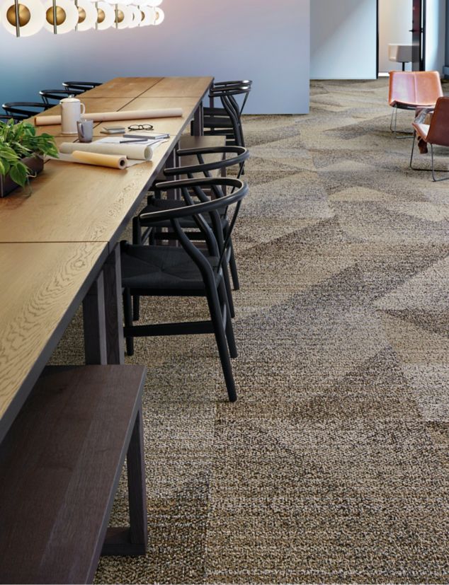 Interface Light Play carpet tile in corporate meeting room with long table and low light fixture