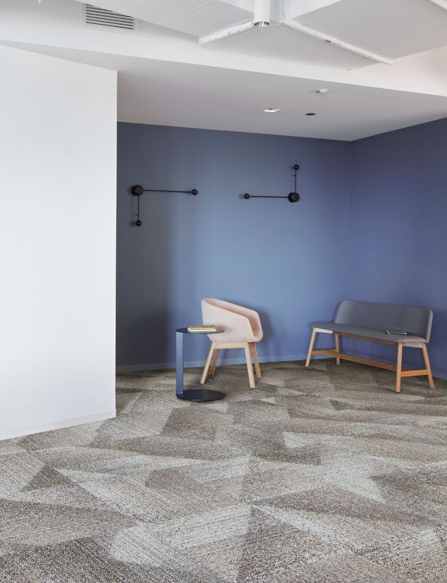 Interface Light Play carpet tile in open workspace area with seating