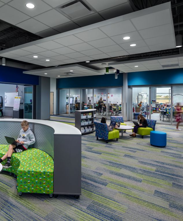 Interface Ground Waves Verse, Harmonize and On Line plank carpet tile in K-12 open classroom