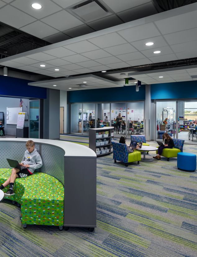 Interface Ground Waves Verse, Harmonize and On Line plank carpet tile in K-12 open classroom