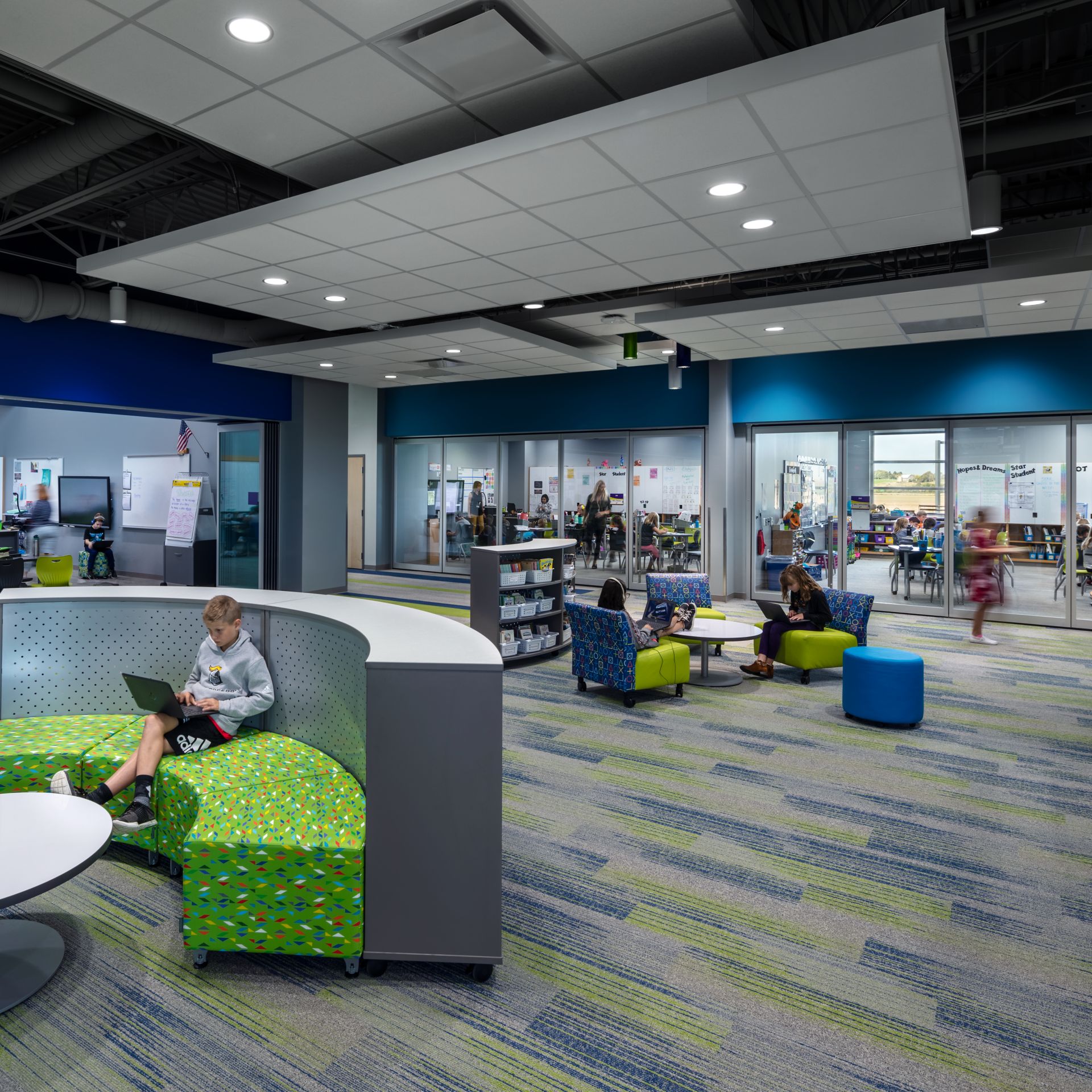Interface Ground Waves Verse, Harmonize and On Line plank carpet tile in K-12 open classroom