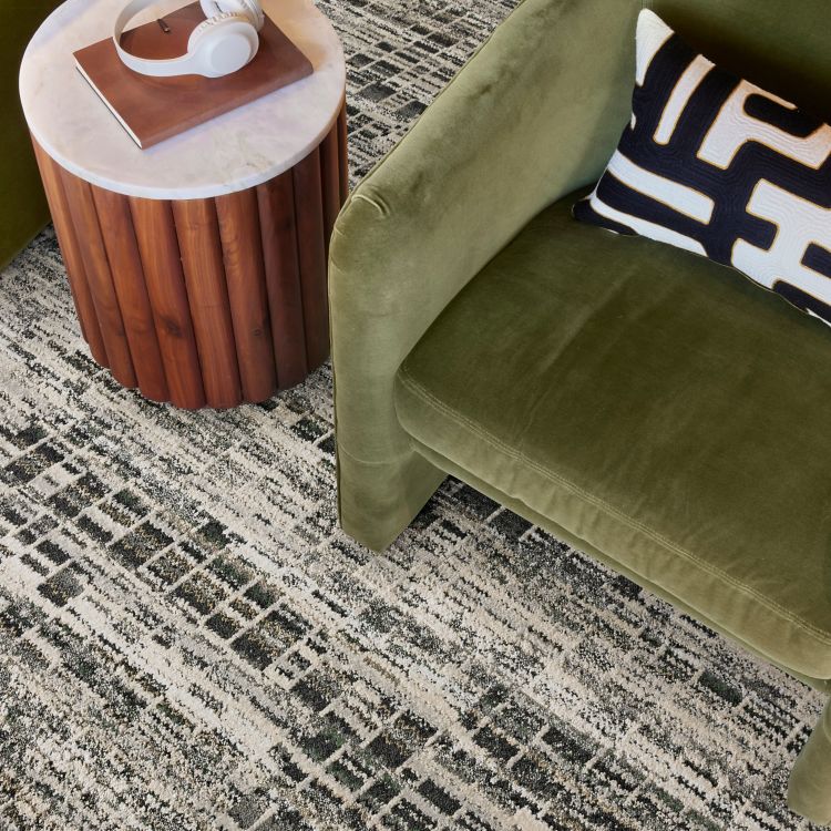 Interface Reflective Sky plank carpet tile in close-up of seating area