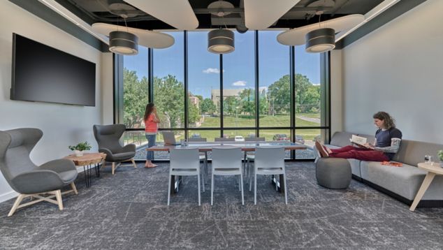 Interface Heartthrob carpet tile in higher ed meeting room