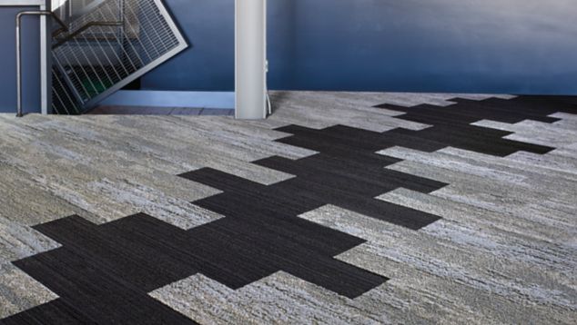 Interface NF400 and NF401 plank carpet tile in a corridor or entryway of a public space