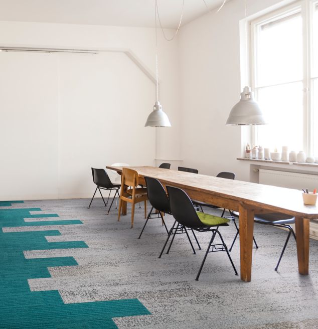 Interface Nature's Course and On Line plank carpet tile in meeting area with long wooden table