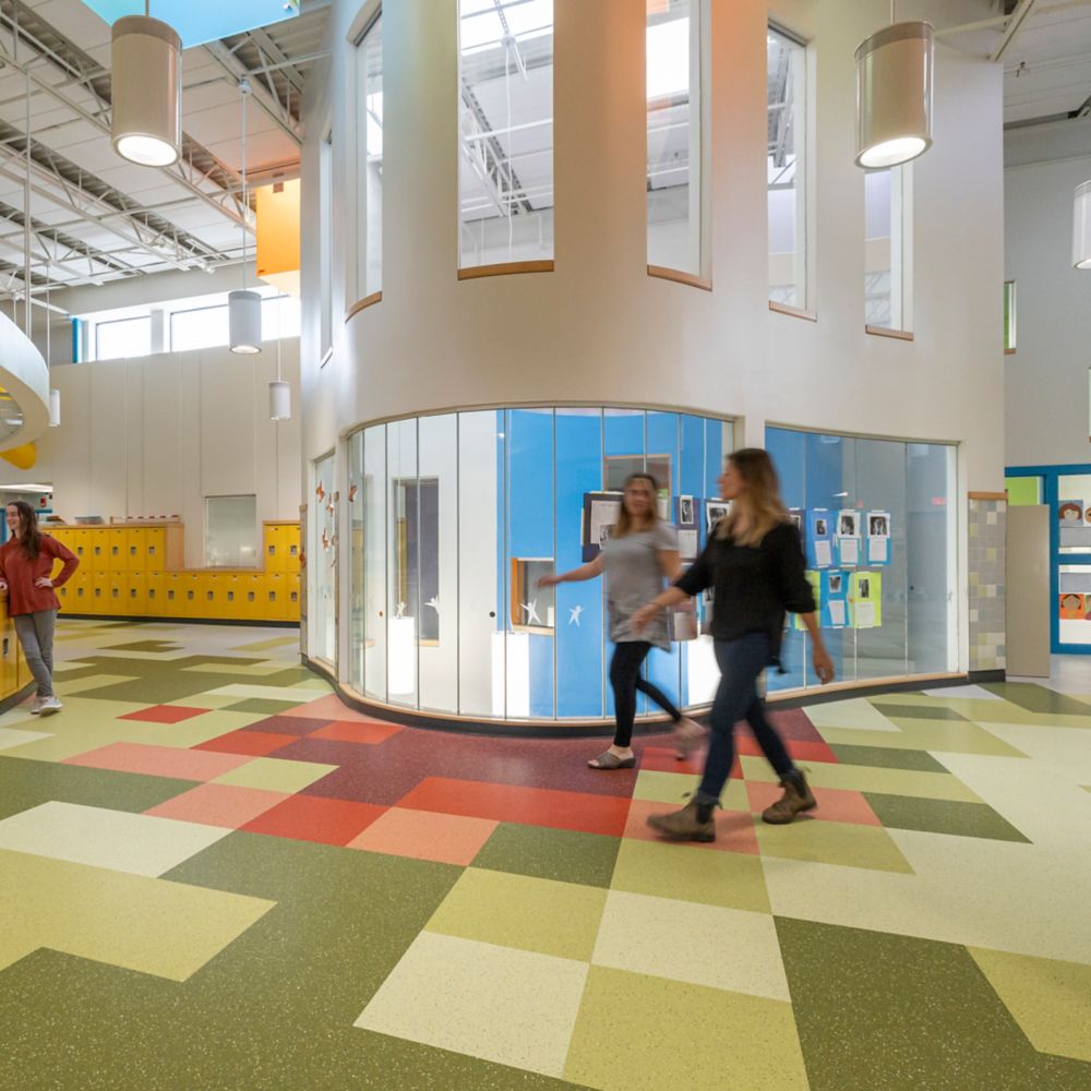 nora by Interface rubber flooring in school lobby area with teachers