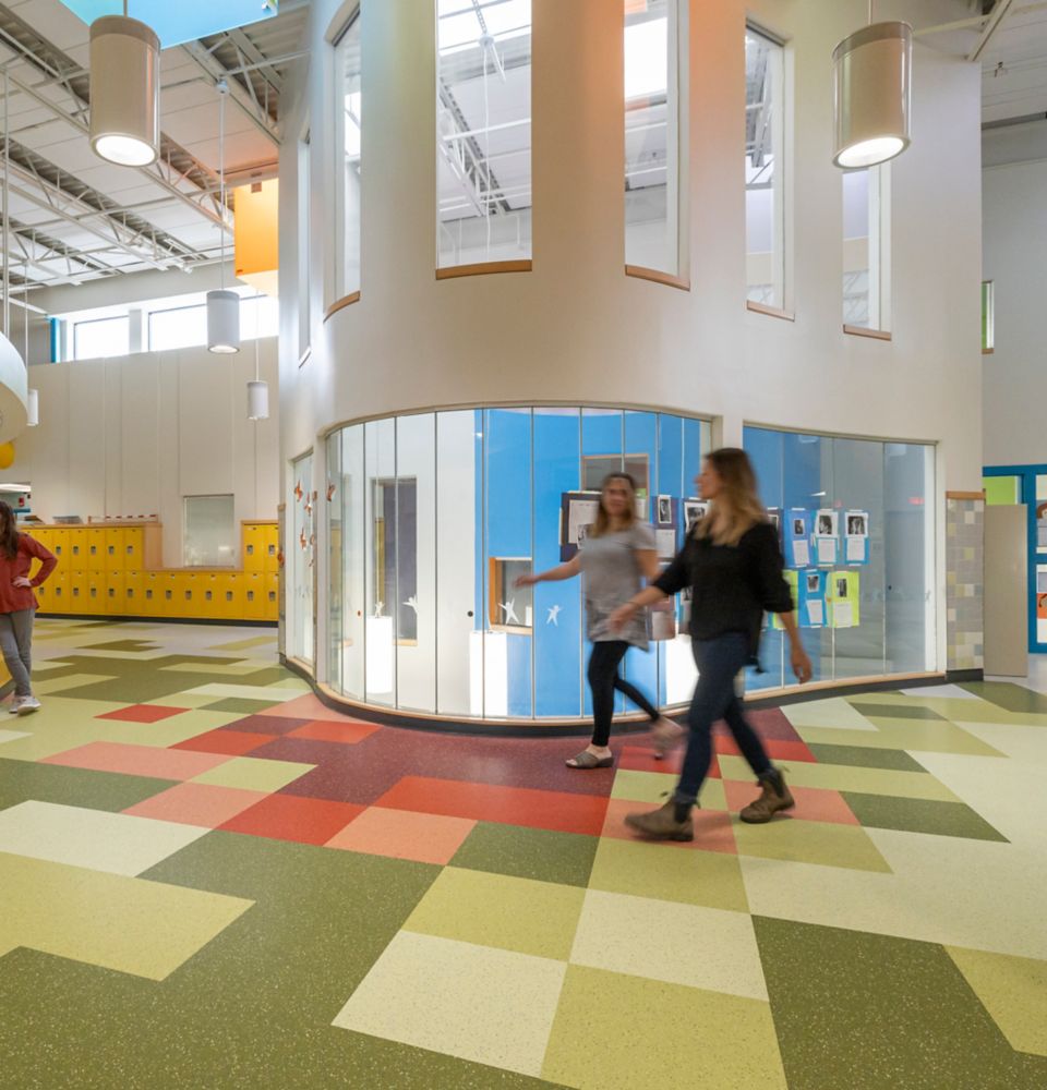 nora by Interface rubber flooring in school lobby area with teachers