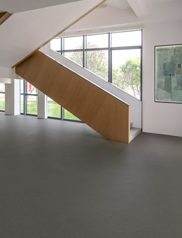 nora by Interface noraplan stone smooth rubber flooring in public space with stairwell