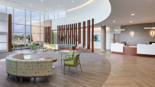 Interface SR899 carpet tiles with Studio Set LVT in healthcare lobby and reception area