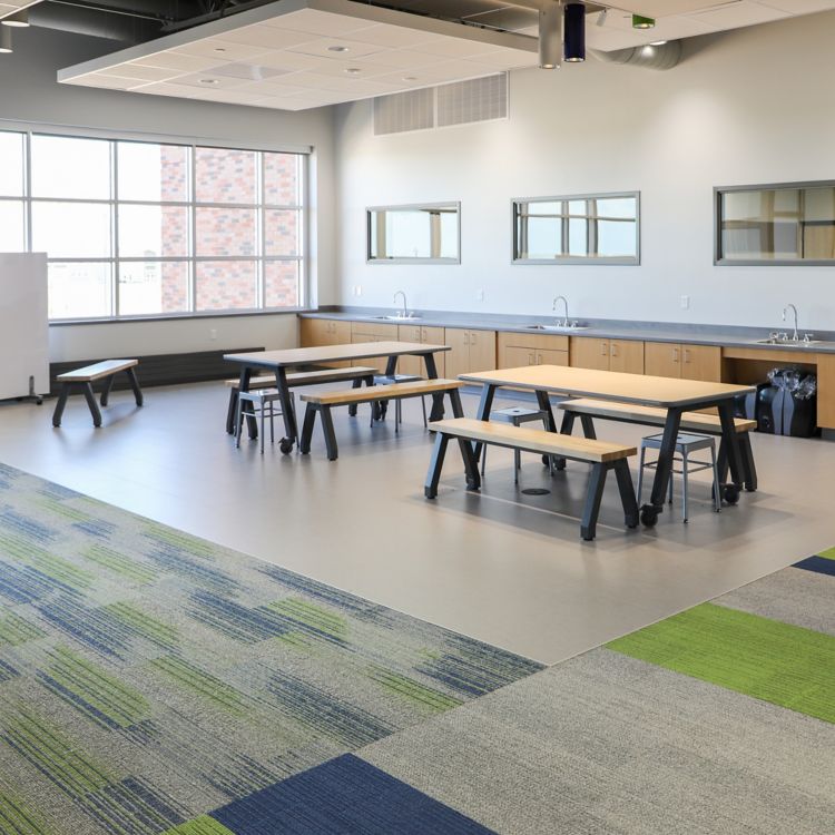 Interface Ground Waves Verse, Harmonize and On Line carpet tile with nora by Interface noraplan valua rubber flooring in K-12 school