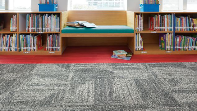 Interface Open Air 403 carpet tile in library with reading bench and childrens books