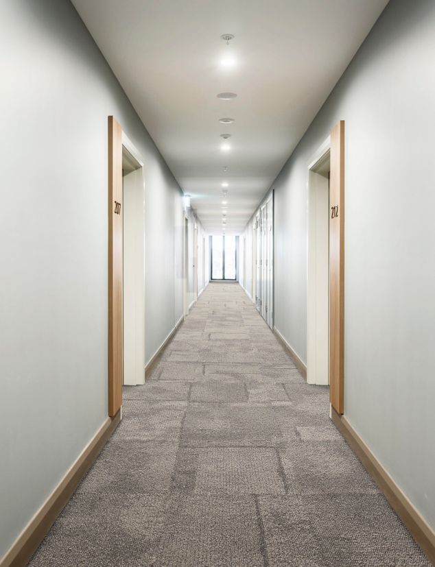 Interface Pillars carpet tile in corridor