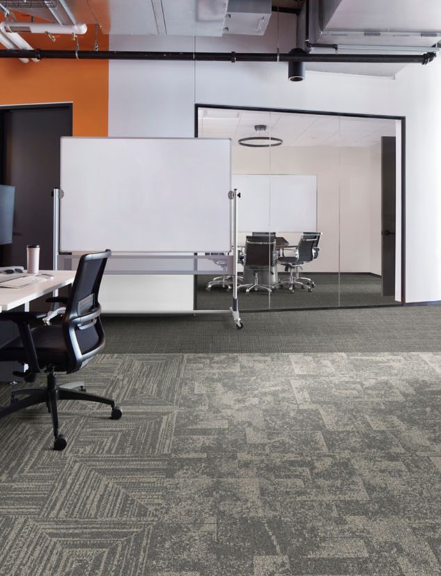 Interface Open Air 401 plank carpet tile in office space with rolling whiteboard and meeting room in background