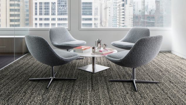 Interface Overedge plank carpet tile with fabric chairs around round table