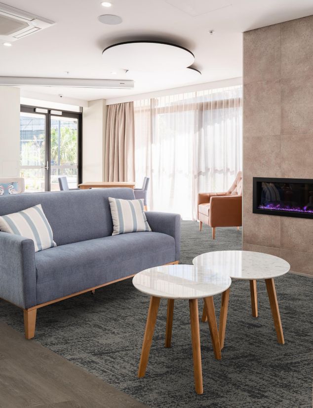 Interface Perfect Pair carpet tile with Northern Grain plank LVT in senior living lounge