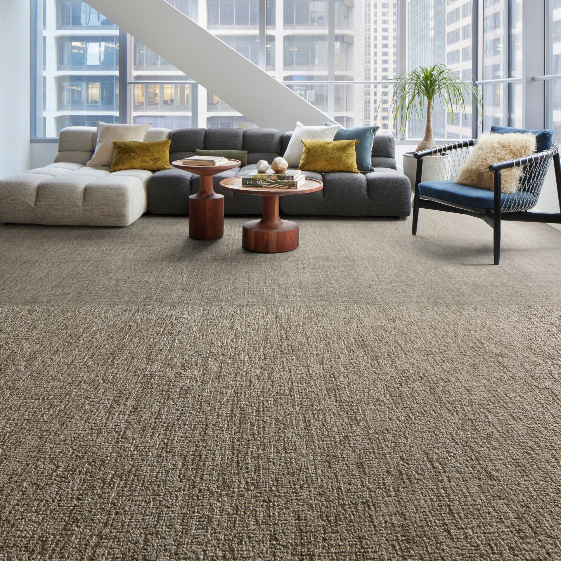 Interface Obligato and Diminuendo plank carpet tile in seating area