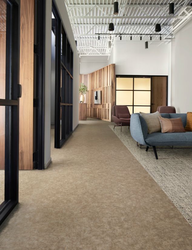 Interface Plaster plank LVT with Simple Does It carpet tile in workplace seating area and corridor