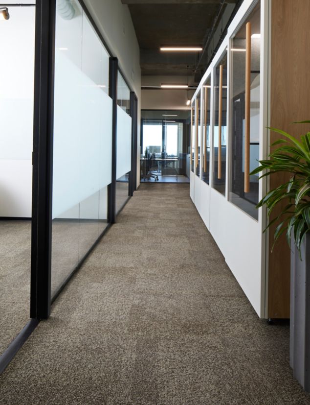 Interface Pressed for Time carpet tile in workplace corridor