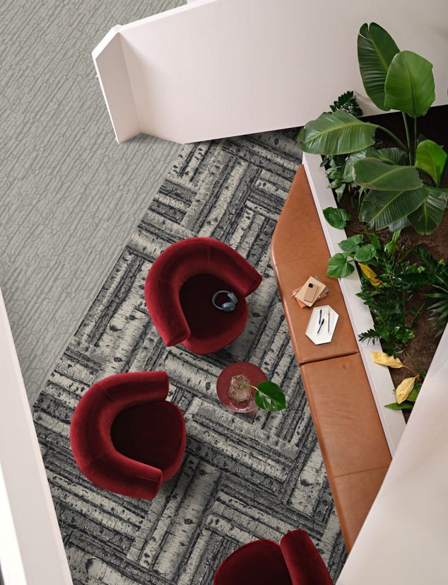 Aerial view of Interface First Light and Quiet Grove plank carpet tile in workplace collaborative space