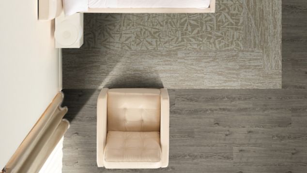 Interface RMS 507 and RMS 508 plank carpet tile with Natural Woodgrains LVT in hotel guest room
