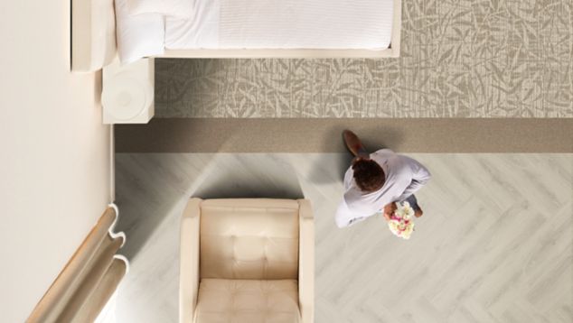 Interface RMS 508 and On Line plank carpet tile with Natural Woodgrains LVT in hotel guest room