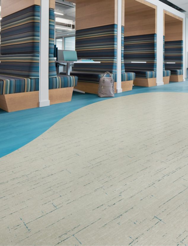 Interface Raw Materials and Studio Set plank LVT in an office collaborative space