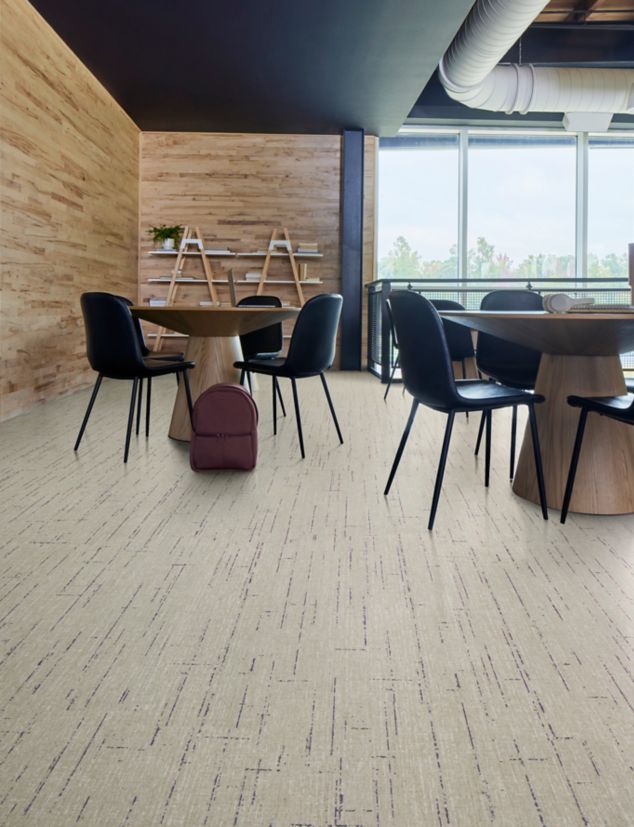 Interface Raw Materials plank LVT in Midnight Purple in collaborative space.