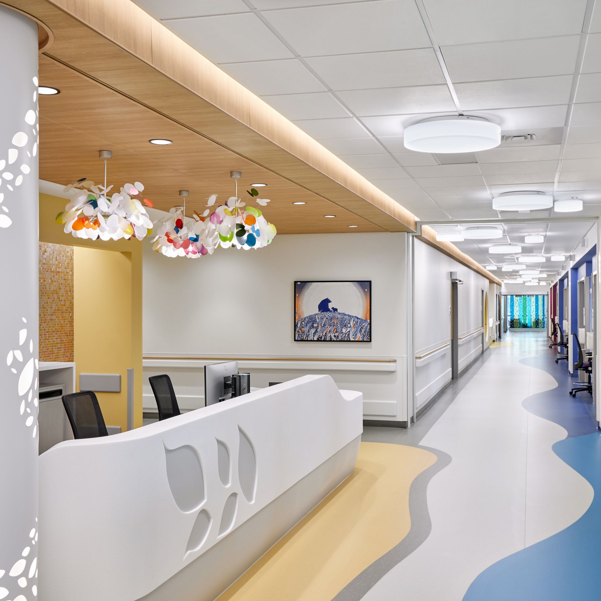nora by Interface noraplan sentica and noraplan environcare rubber flooring in hospital corridor