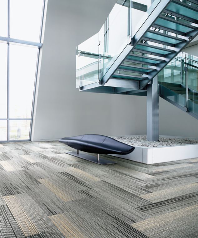 Interface SL930 plank carpet tile in stairwell area with bench