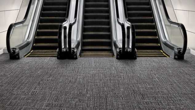 Interface SR899 carpet tile with escalator