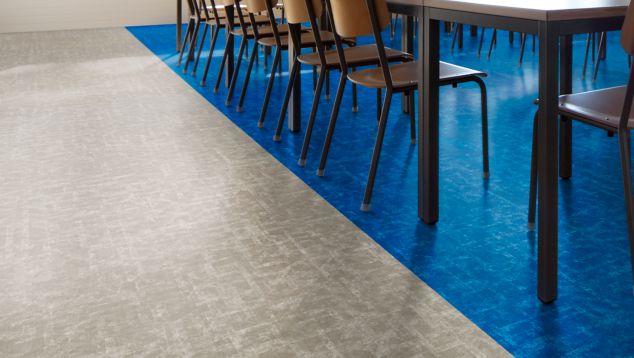 Interface Scorpio LVT in common area with long tables and chairs