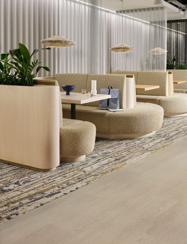 Interface Shifting Seasons plank carpet tile with Northern Grain plank LVT in workplace break area