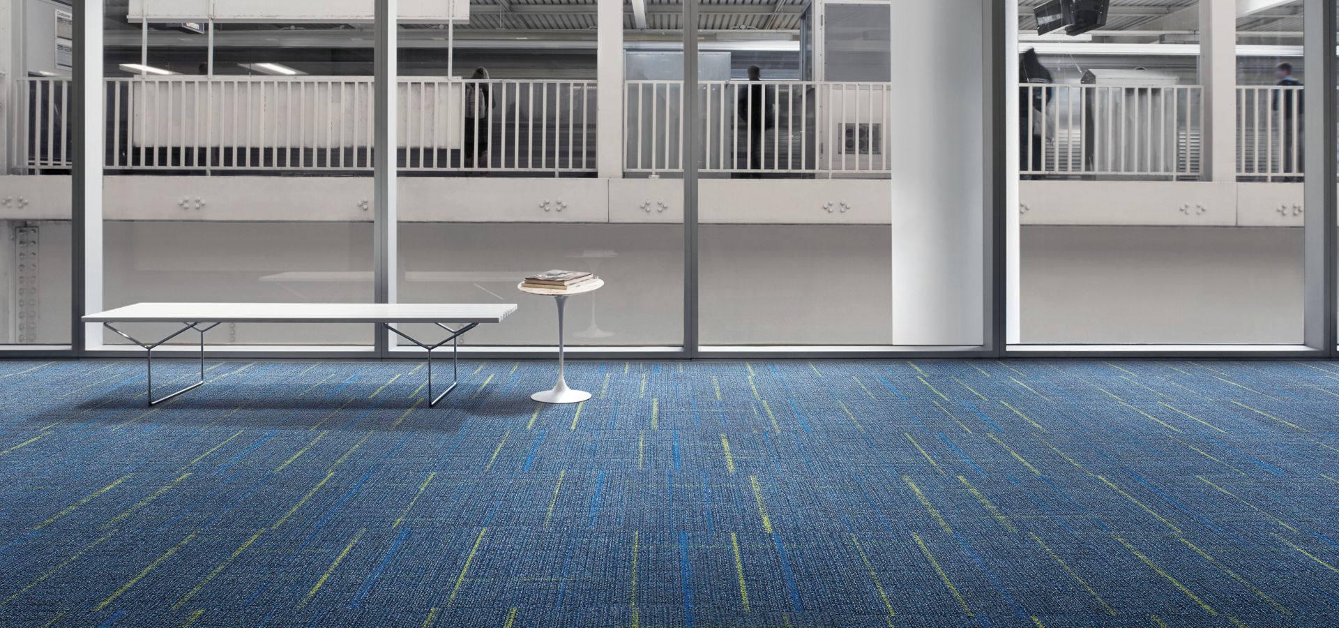 Interface Sidetrack carpet tile in lobby space with bench