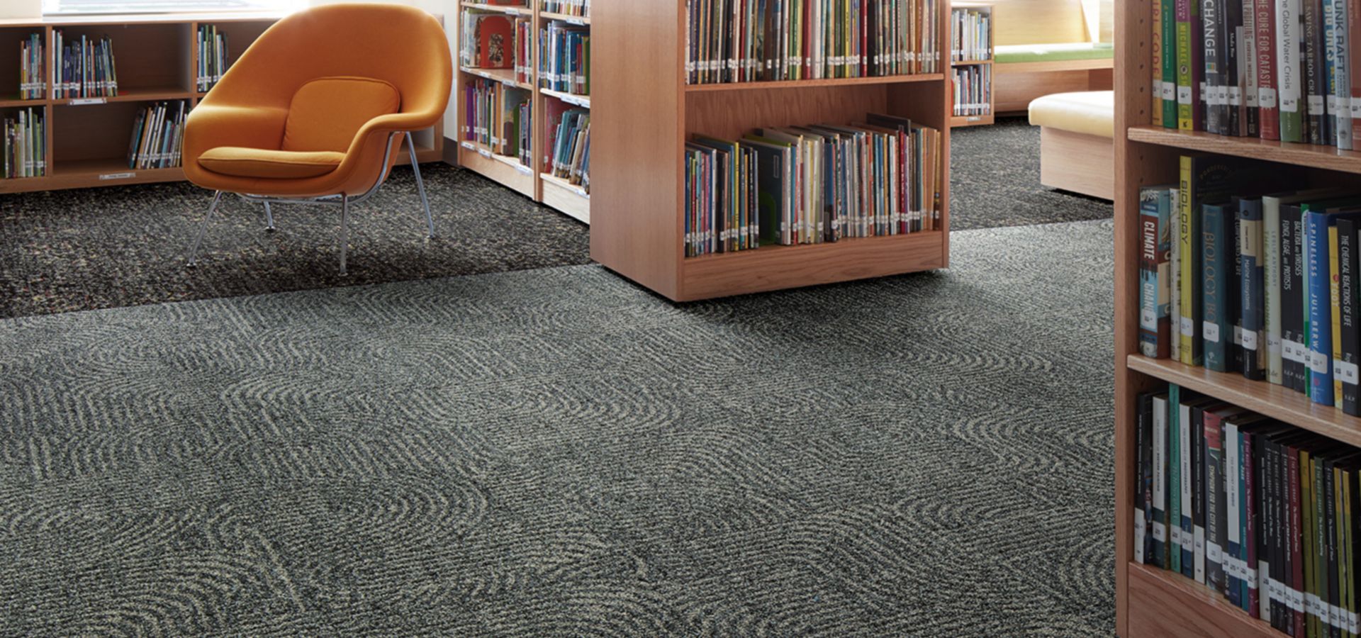 Interface Step this Way and Step This way carpet tile in open space library setting
