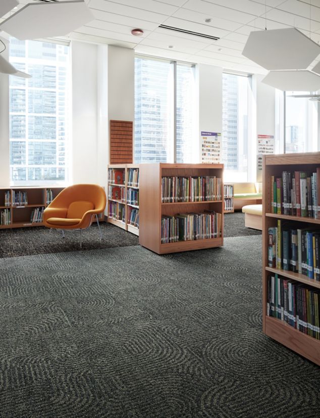 Interface Step this Way and Step This way carpet tile in open space library setting