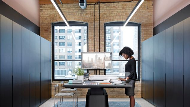 Interface Step in Time and Walk the Aisle carpet tile in open meeting room with person standing