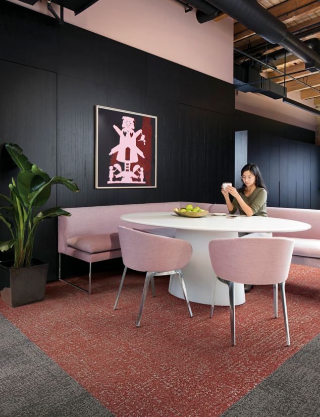 Interface Step it Up and Step in Time carpet tile in seating area with pink chairs 